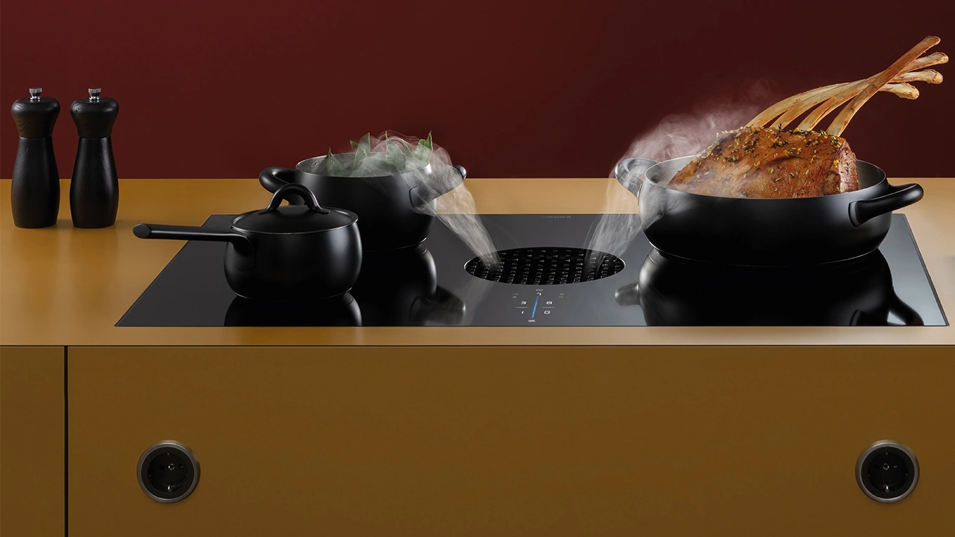 BORA X PURE Kochfeldabzug bora x pure kochfeld beim absaugen von kochdunst aus töpfen und pfannen
