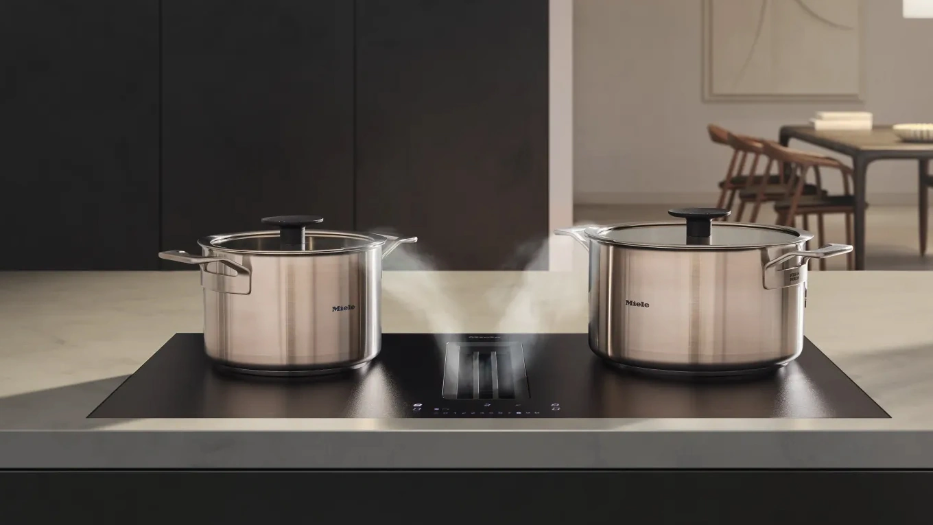Miele Töpfe miele töpfe aus edelstahl auf dem kmda kochfeld mit dunstabzug