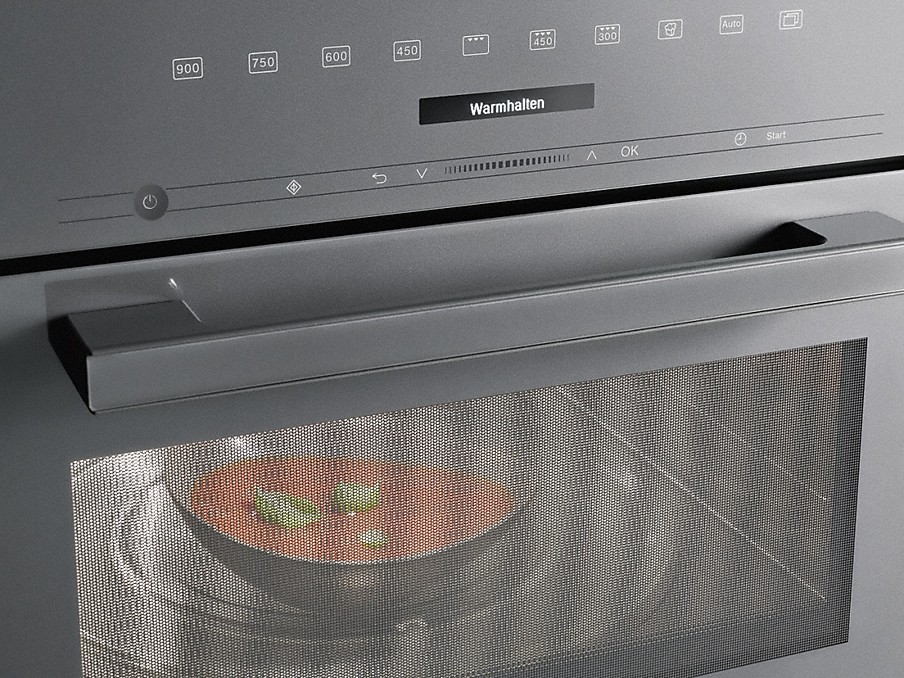 Miele Warmhalteautomatik schale mit roter suppe in einer Miele Mikrowelle mit warmhalte automatik
